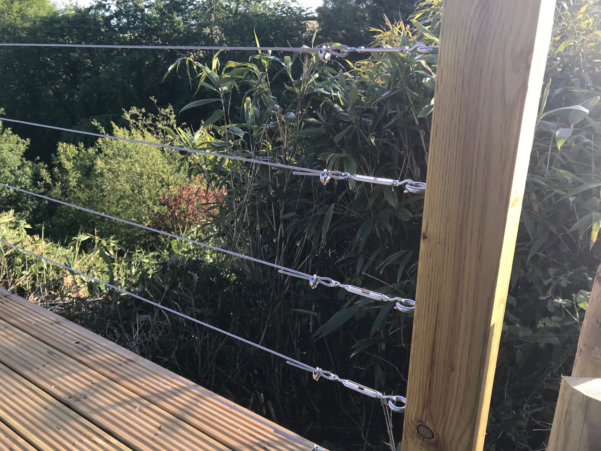 Wire balustrade stainless steel wire clamp decking patio area