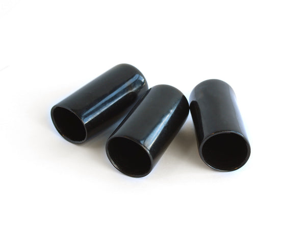 Black plastic end caps for wire rope